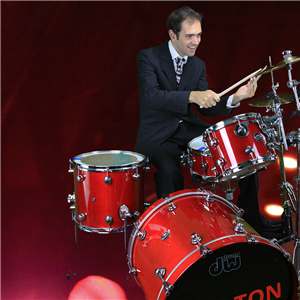 Gabriele plays live music with his drums